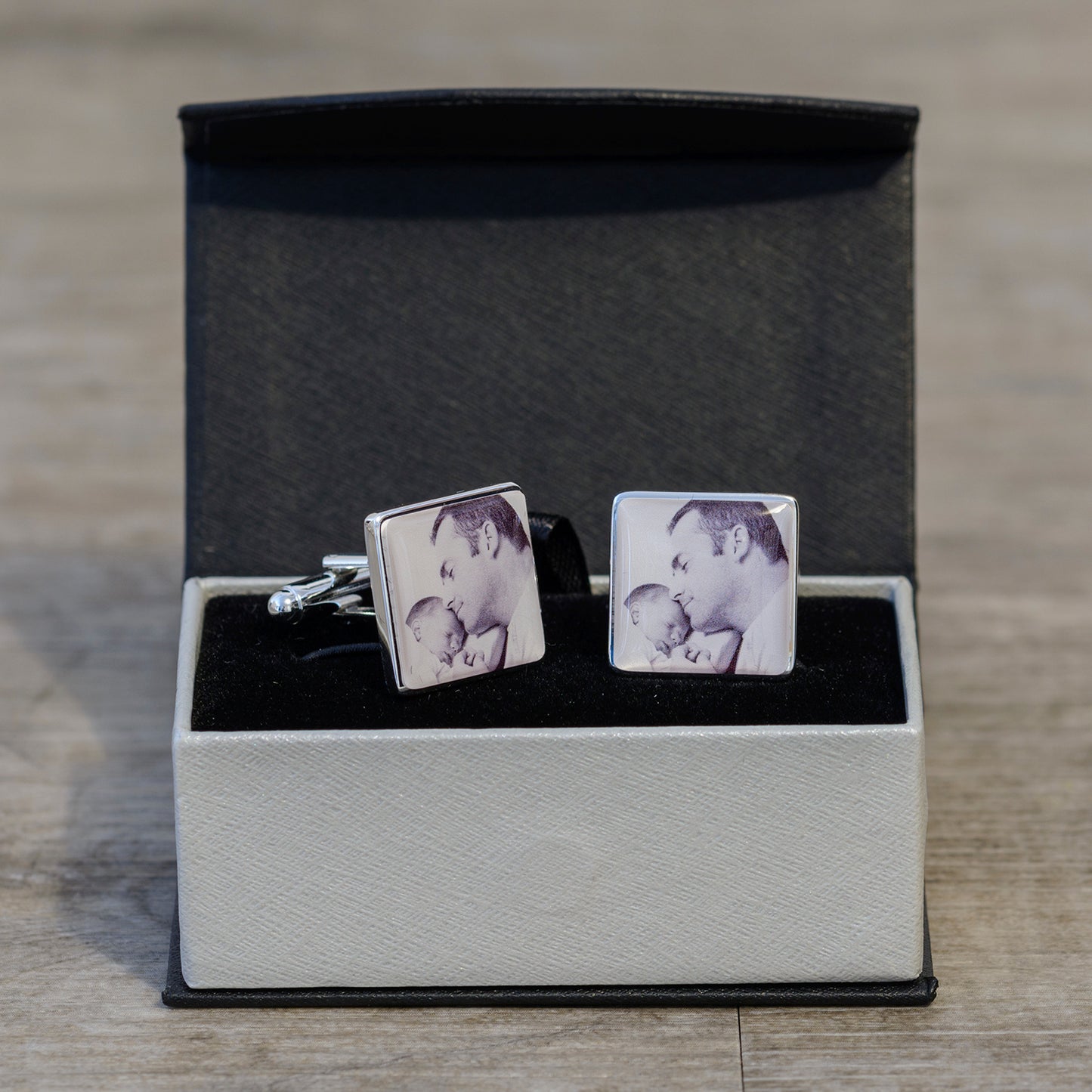 Double photo cufflinks in high quality silver finish, upload a different photo for each cufflink or keep them as a pair. Shown with black and white image and in presentation gift box