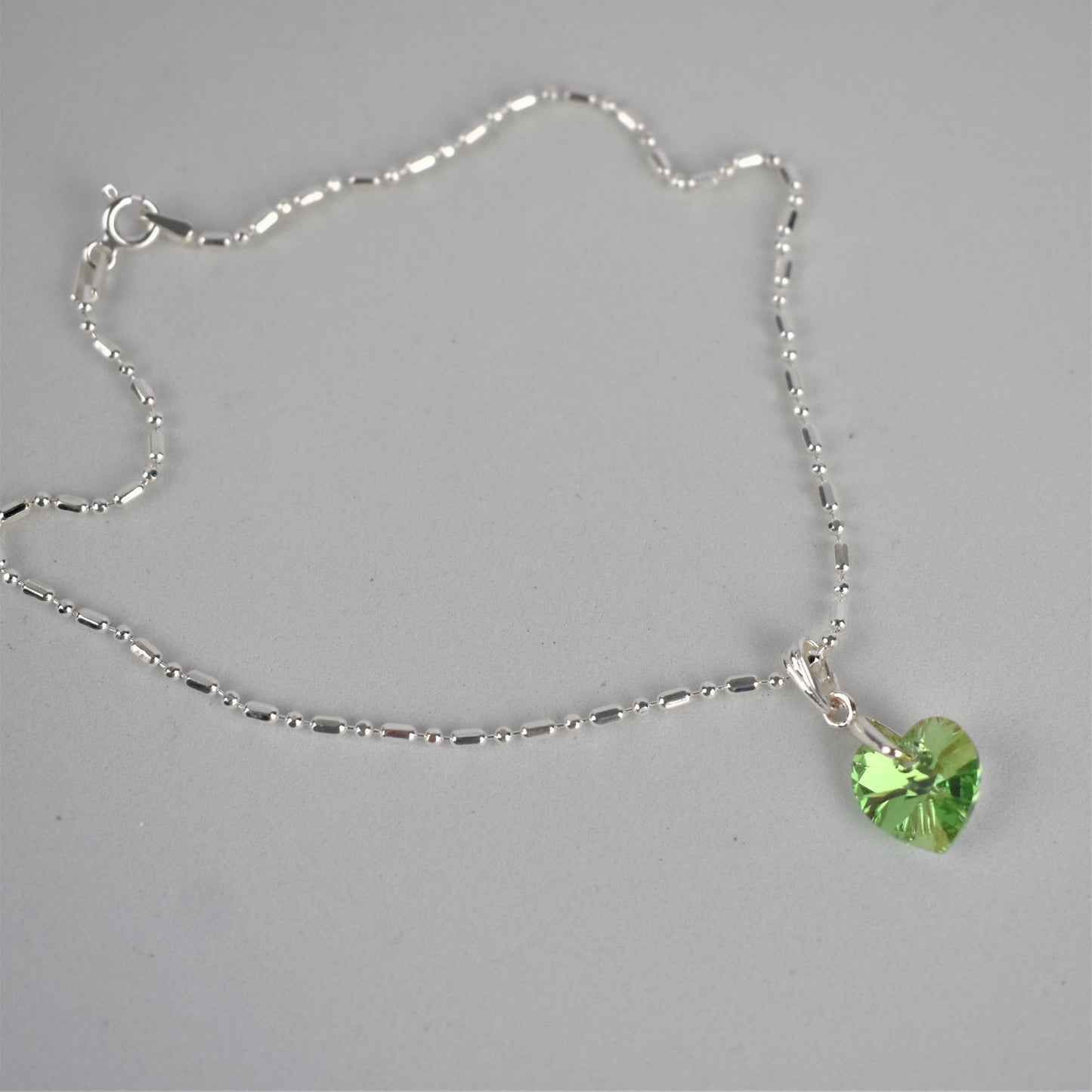 mirror link anklet with birthstone coloured crystal heart