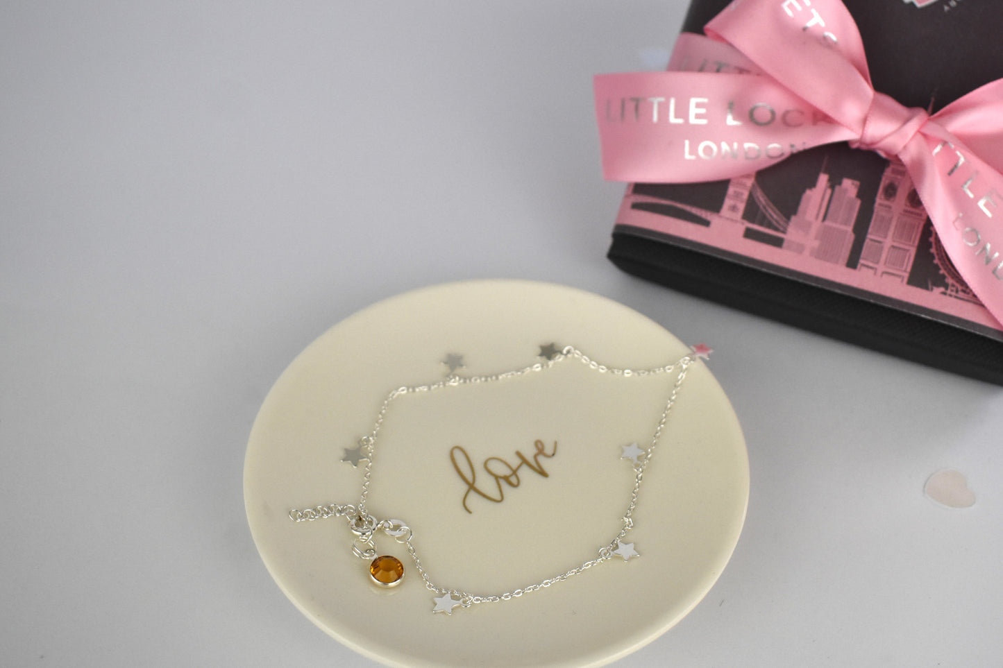 Boho Star Sterling Silver Anklet with Crystal Birthstone Charm. Crafted from sterling silver with flat cable chain links to sit comfortably. A secure fit, thanks to its 9 inch chain and a 1 inch extender.
