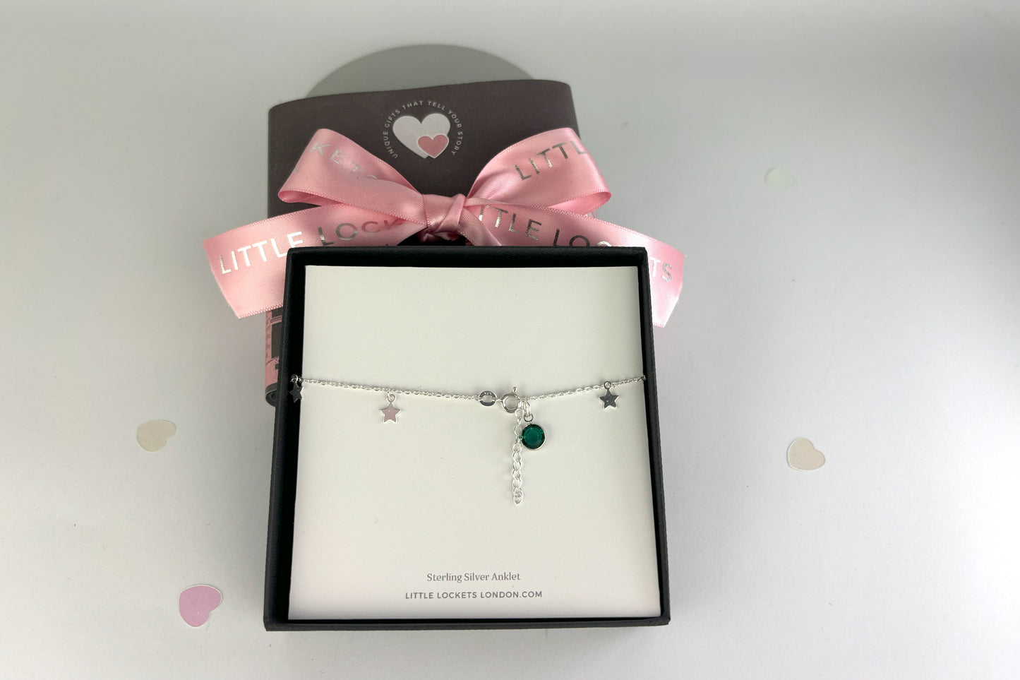Boho Star Sterling Silver Anklet with Crystal Birthstone Charm. Crafted from sterling silver with flat cable chain links to sit comfortably. A secure fit, thanks to its 9 inch chain and a 1 inch extender. Shown in gift box