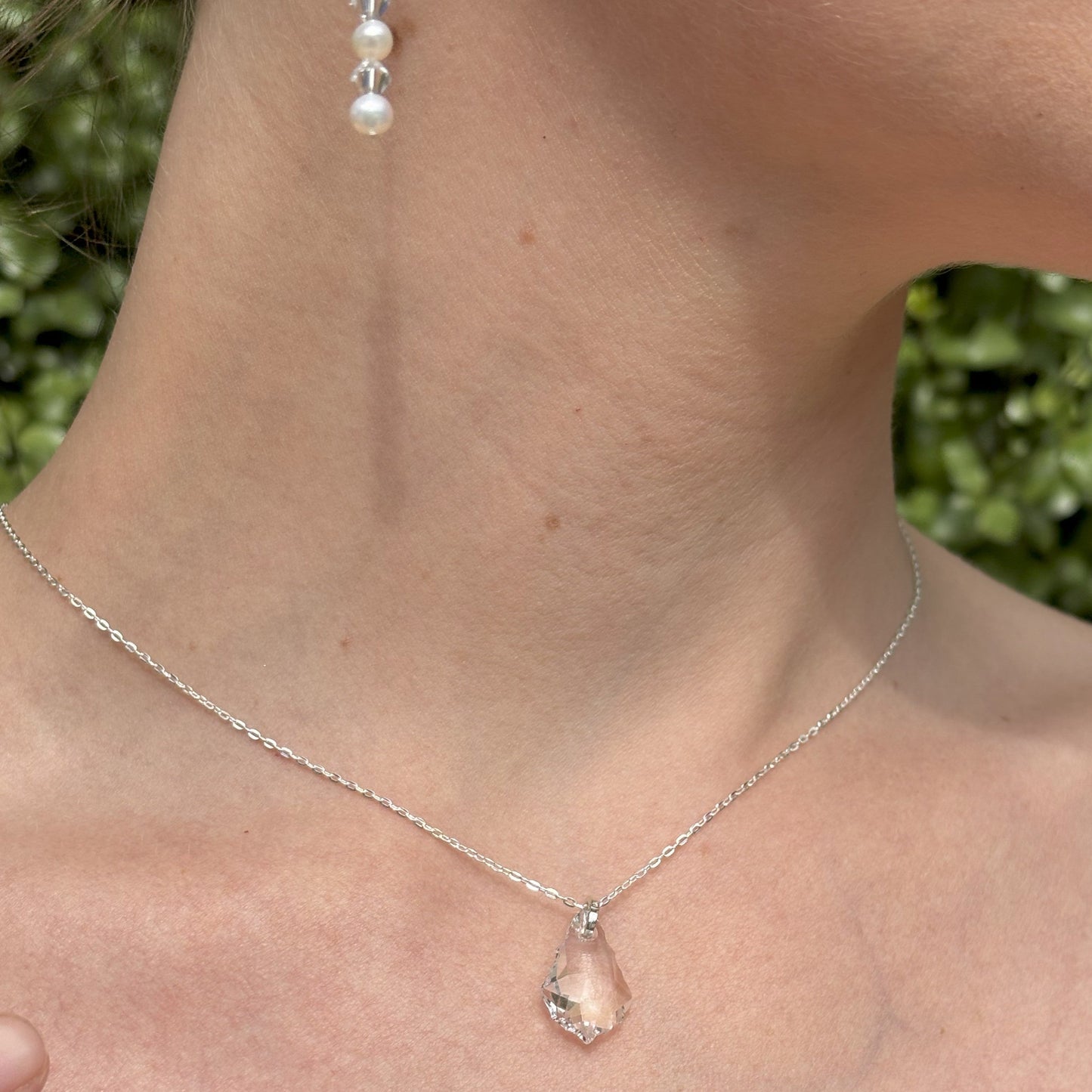 Our simple Baroque pendant features the highest quality crystal drop suspended from a sterling silver adjustable chain. The back of the necklace features two further bqroque drops, making it the perfect back drop necklace for wedding or cocktail dresses. Shown with our freshwater pearl and crystal earrings (see separate listing).