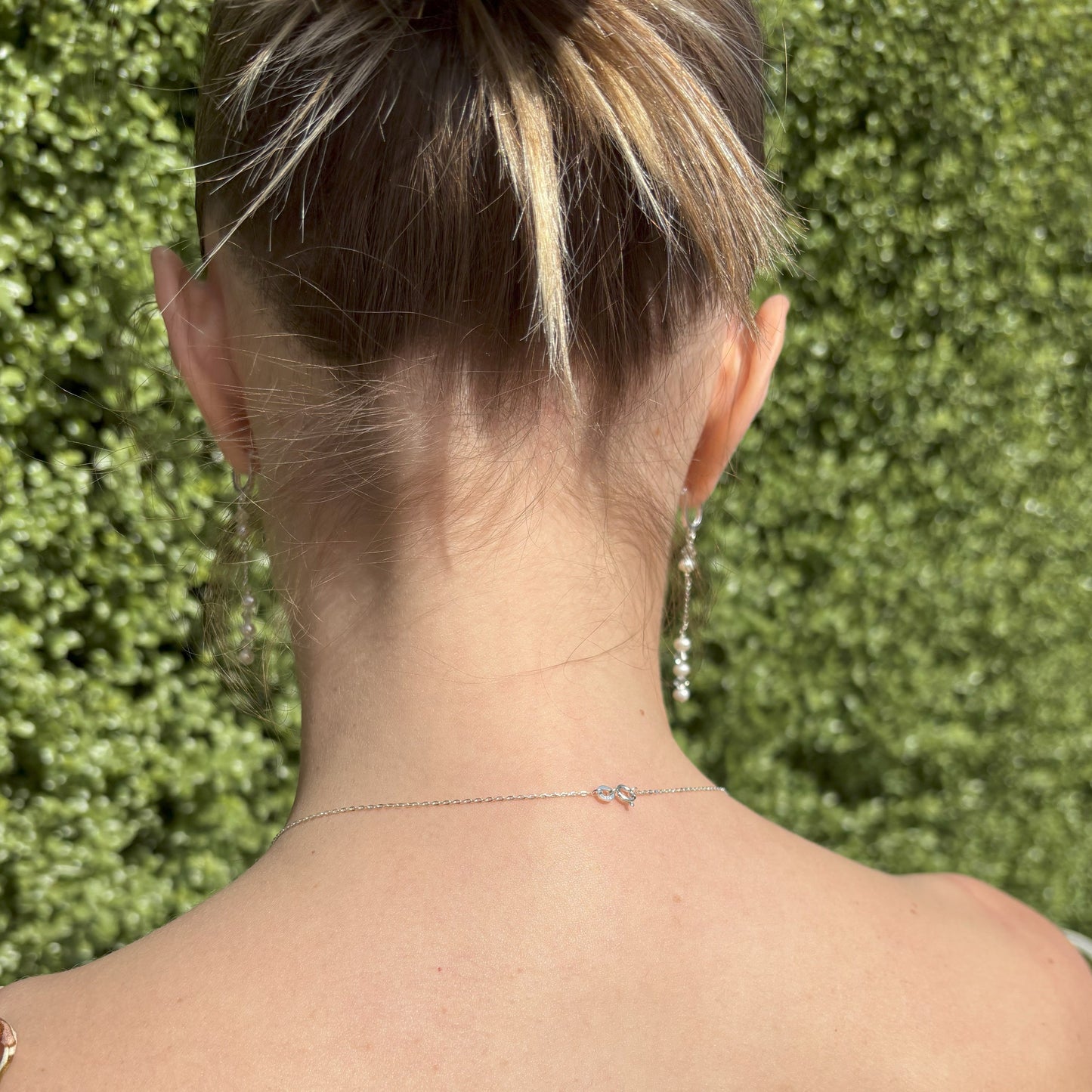 The back drop is easily removed to form a traditional necklace