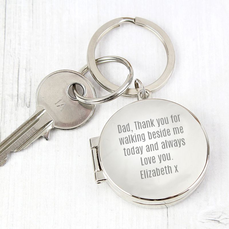 round chrome locket keyring with personal emgraved message from the Bride to her Dad - Thank you for walking beside me today and always, love you. Elizabeth. Takes two photographs