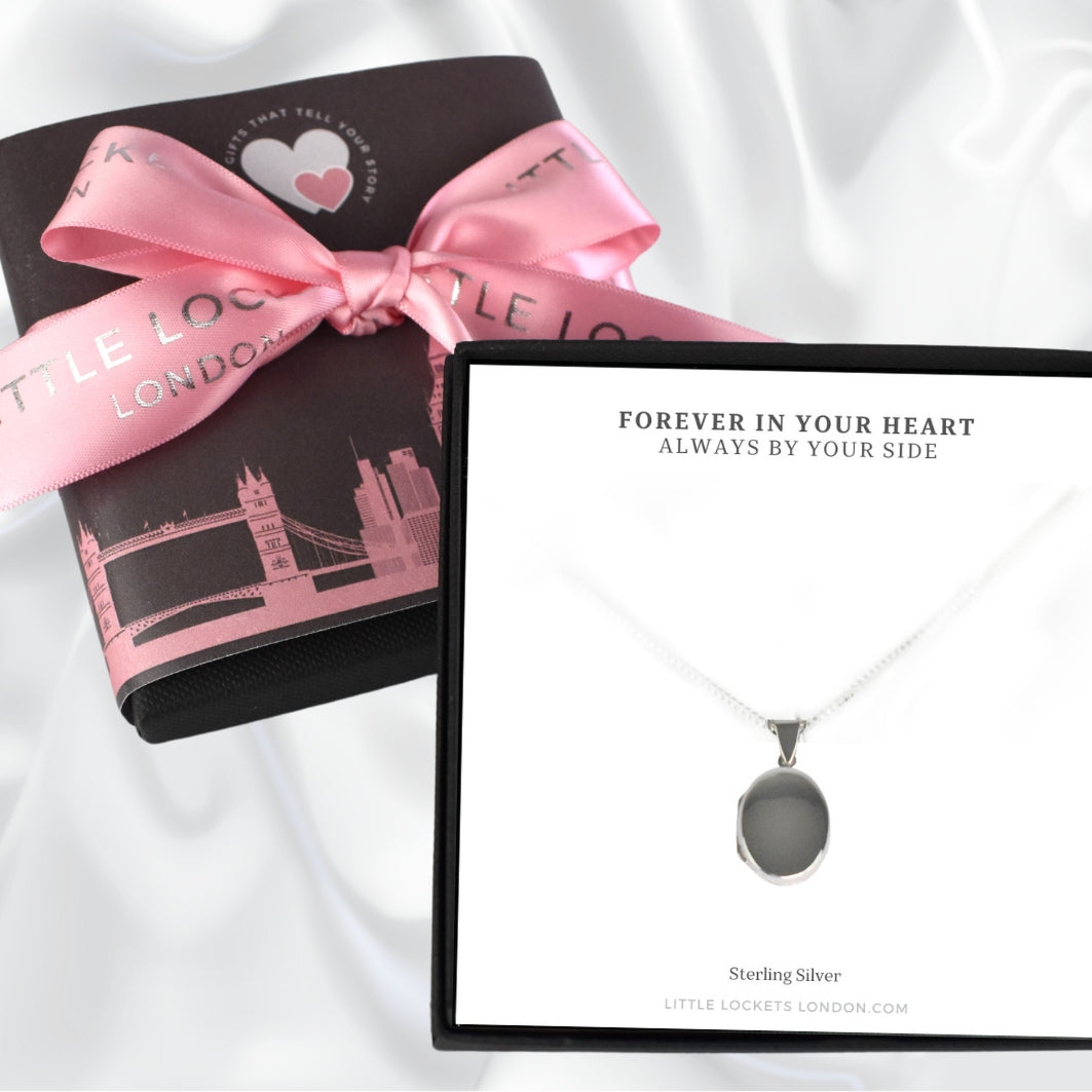 Your locket will be mounted on a card with the message of your choice before being placed in a branded gift box. Photo shows upgraded gift wrap.
