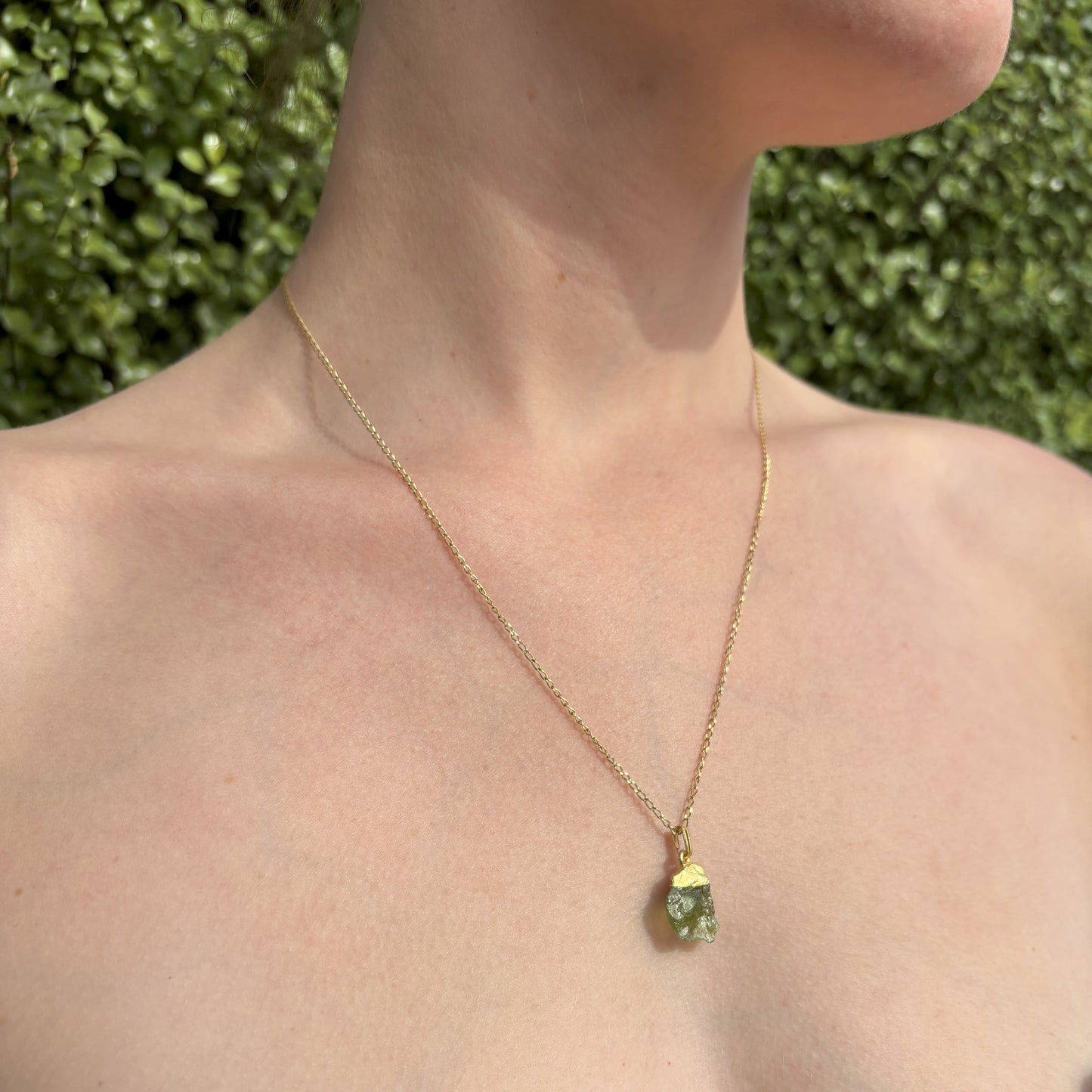 "Uncut Peridot gemstone with unique texture and colour"