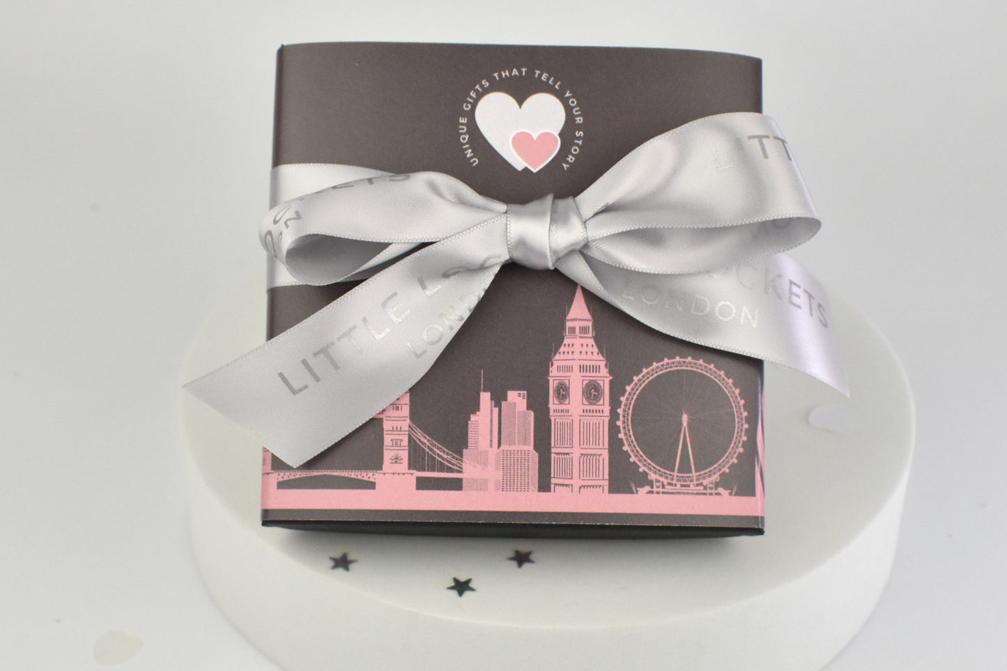 Option to upgrade to a Little Lockets London wrap and satin tied bow