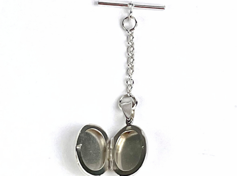 Lapel locket shown open with t-bar fastening