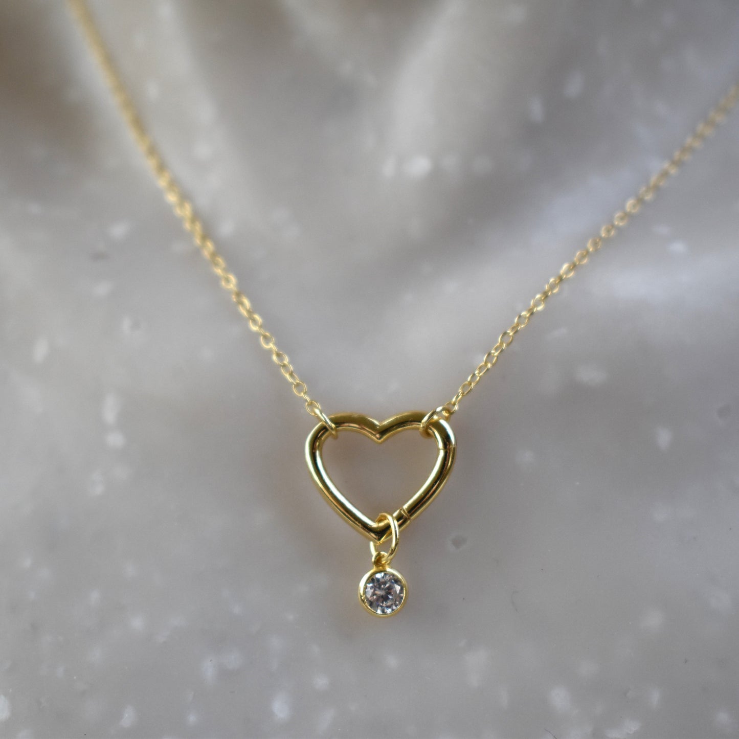 Gold plated open heart necklace with hidden hinge for birthstones