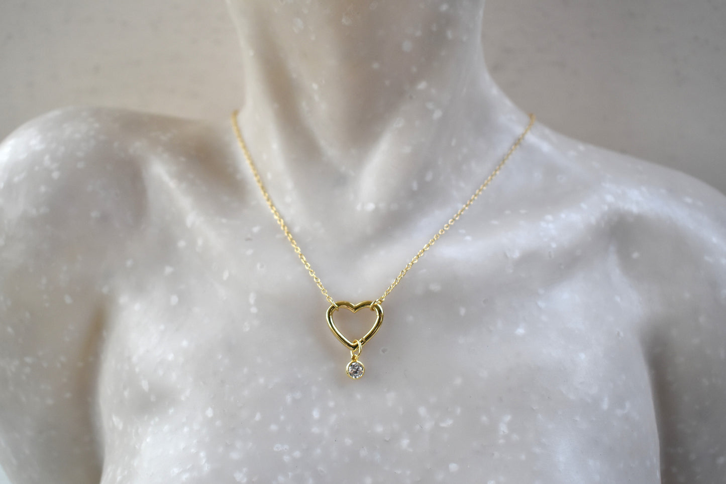 Gold plated open heart necklace with hidden hinge for birthstones