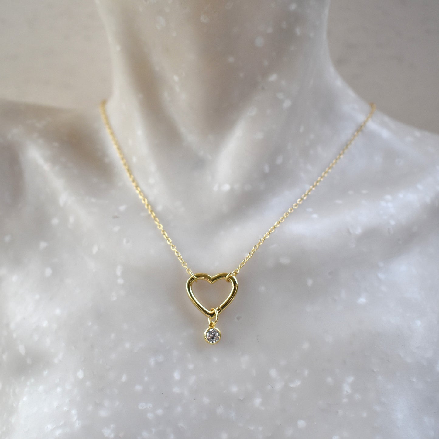 Gold plated open heart necklace with hidden hinge for birthstones