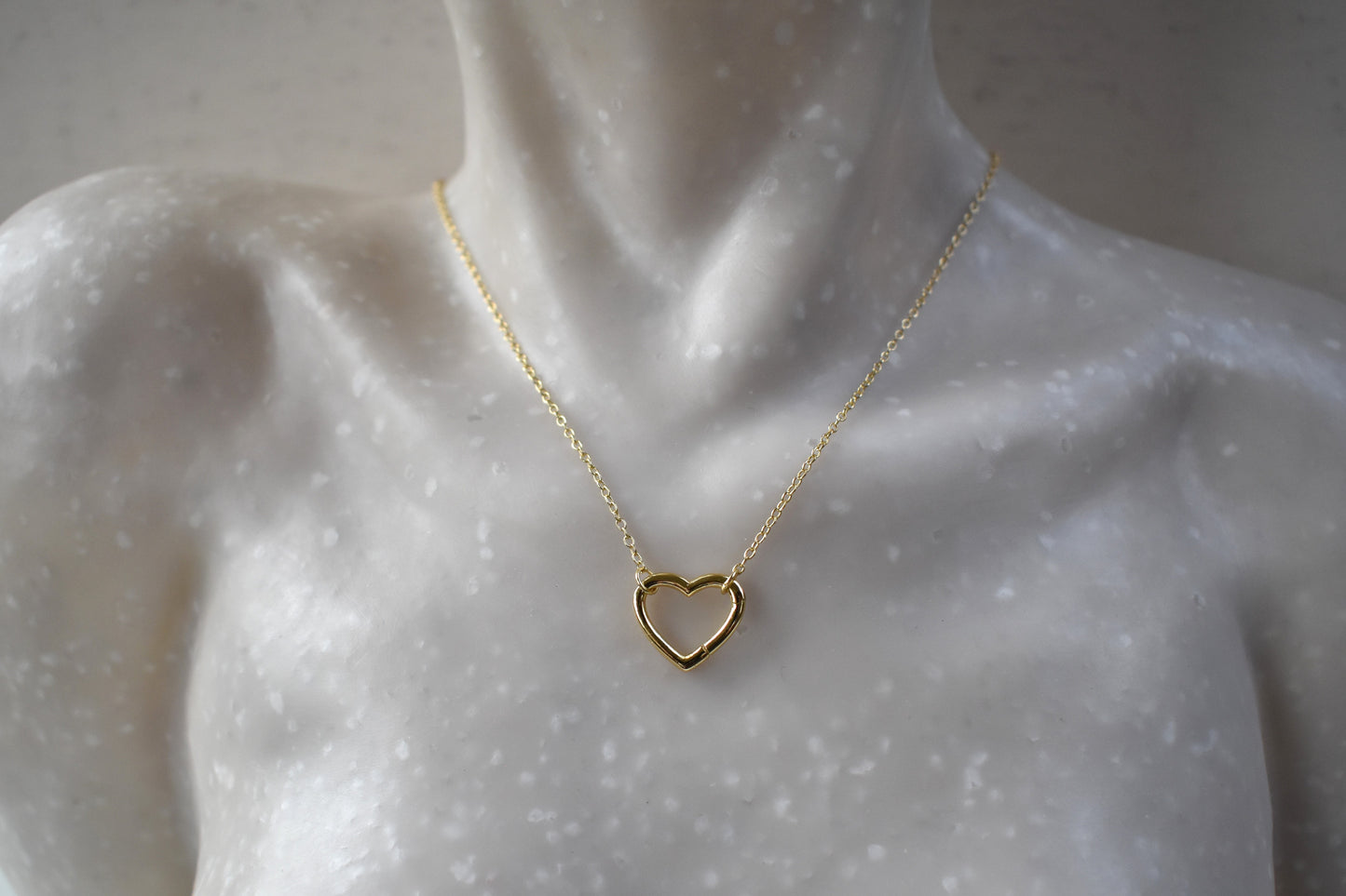 Gold plated open heart necklace with hidden hinge for birthstones