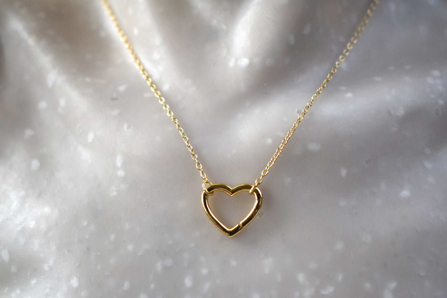 Gold plated open heart necklace with hidden hinge for birthstones