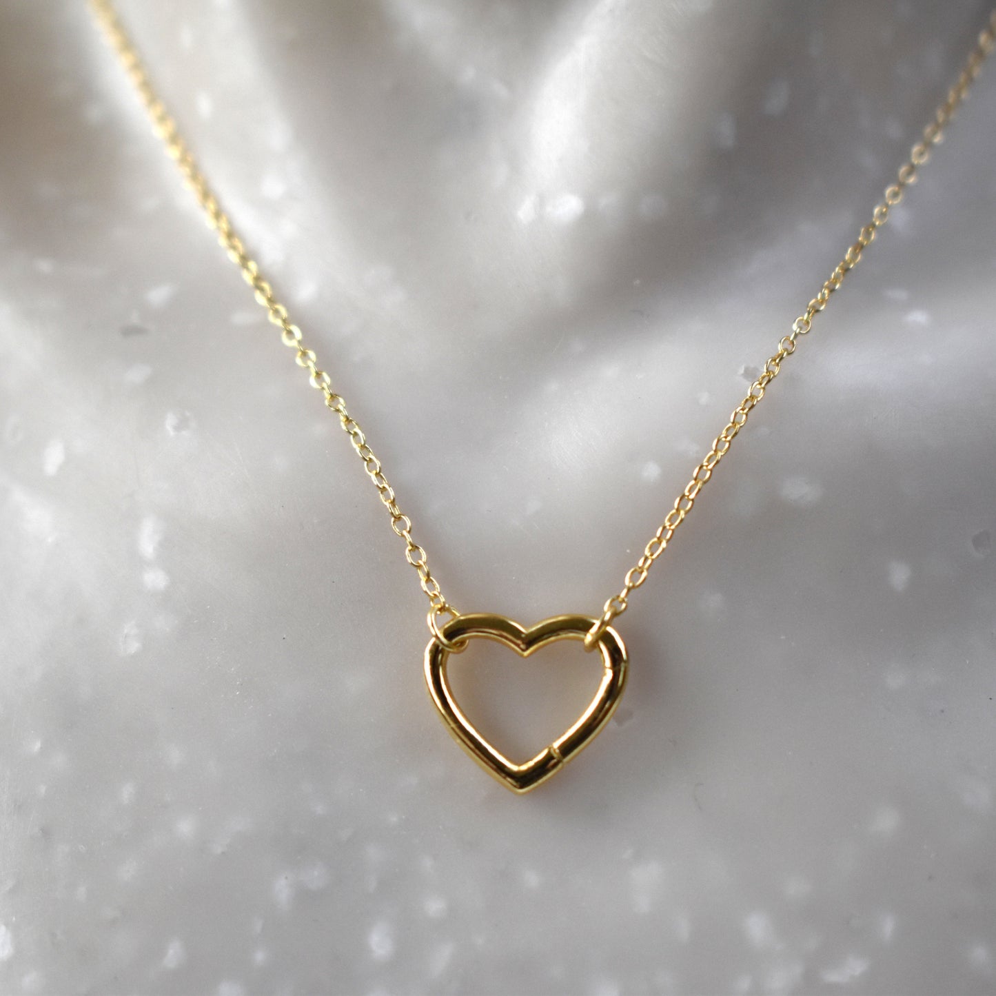 Gold plated open heart necklace with hidden hinge for birthstones