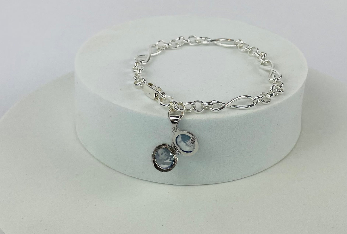 Sterling silver Infinity link bracelet with miniature sterling silver photo locket holds up to two miniature photos