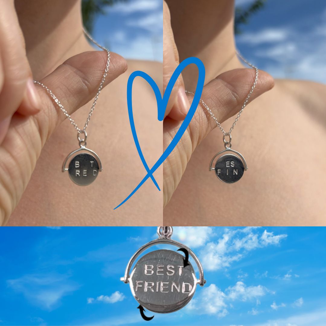 Sterling silver spinner necklace with lettering either side. When spon is forms the words "Best Friend"