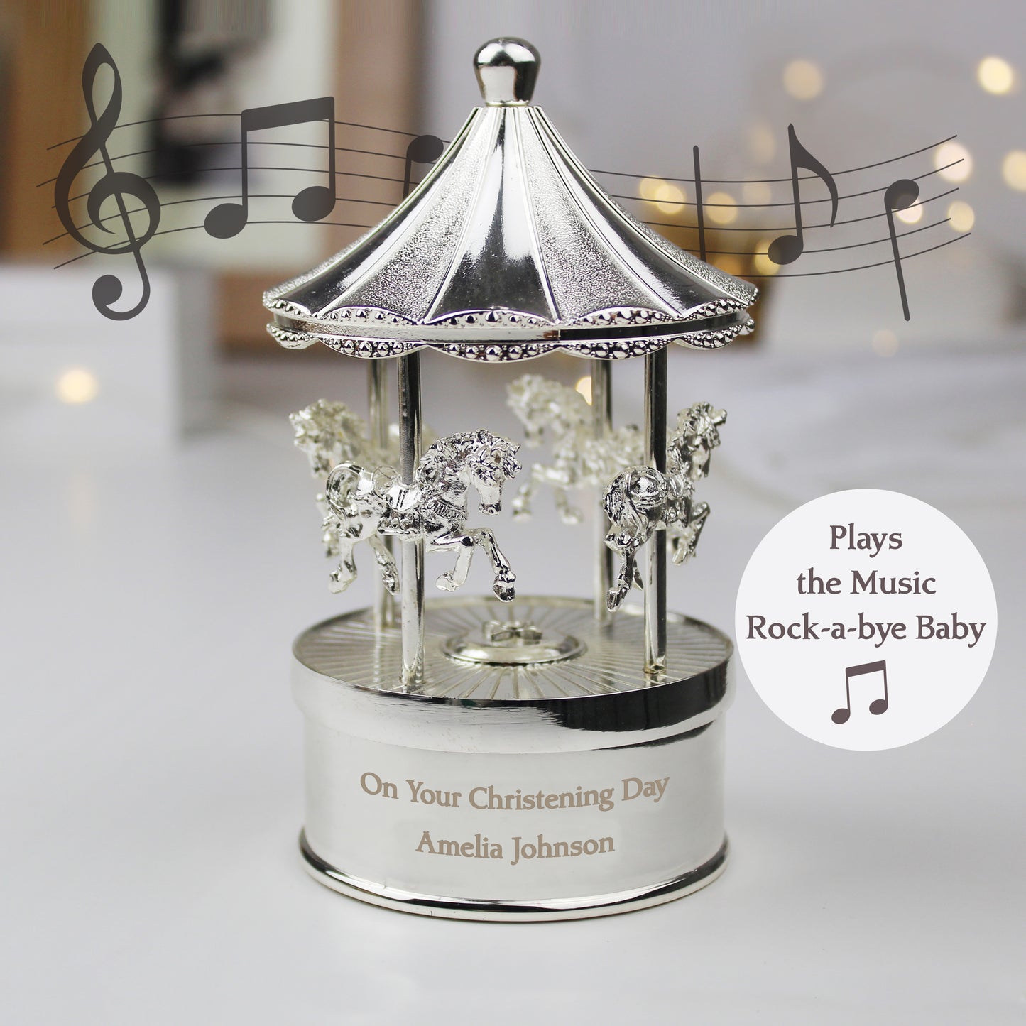 Pretty carousel music box, plays Rock-a-bye baby. Can be engraved with your own message.