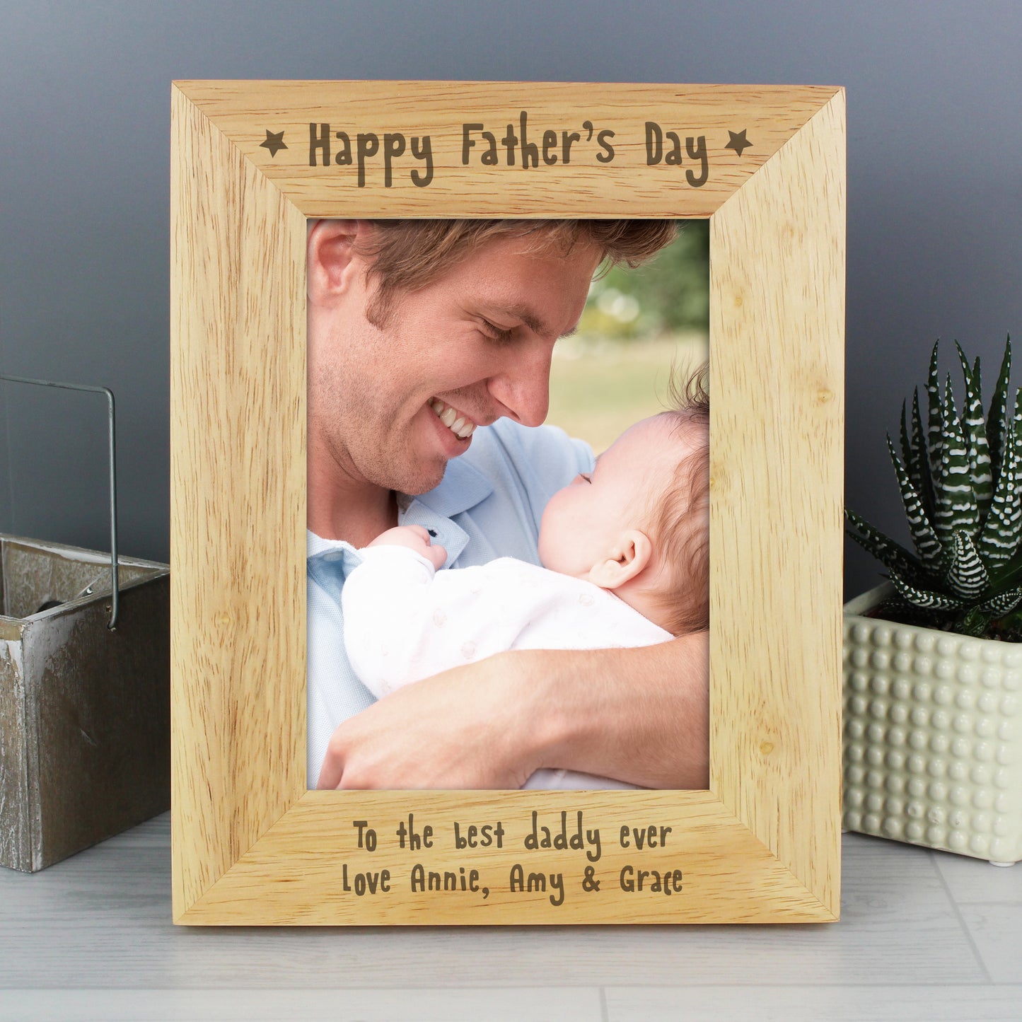 Wooden frame holding 5 x 7 inch photo. Happy Father's Day at the top of the frame and your own message at the foot of the frame.