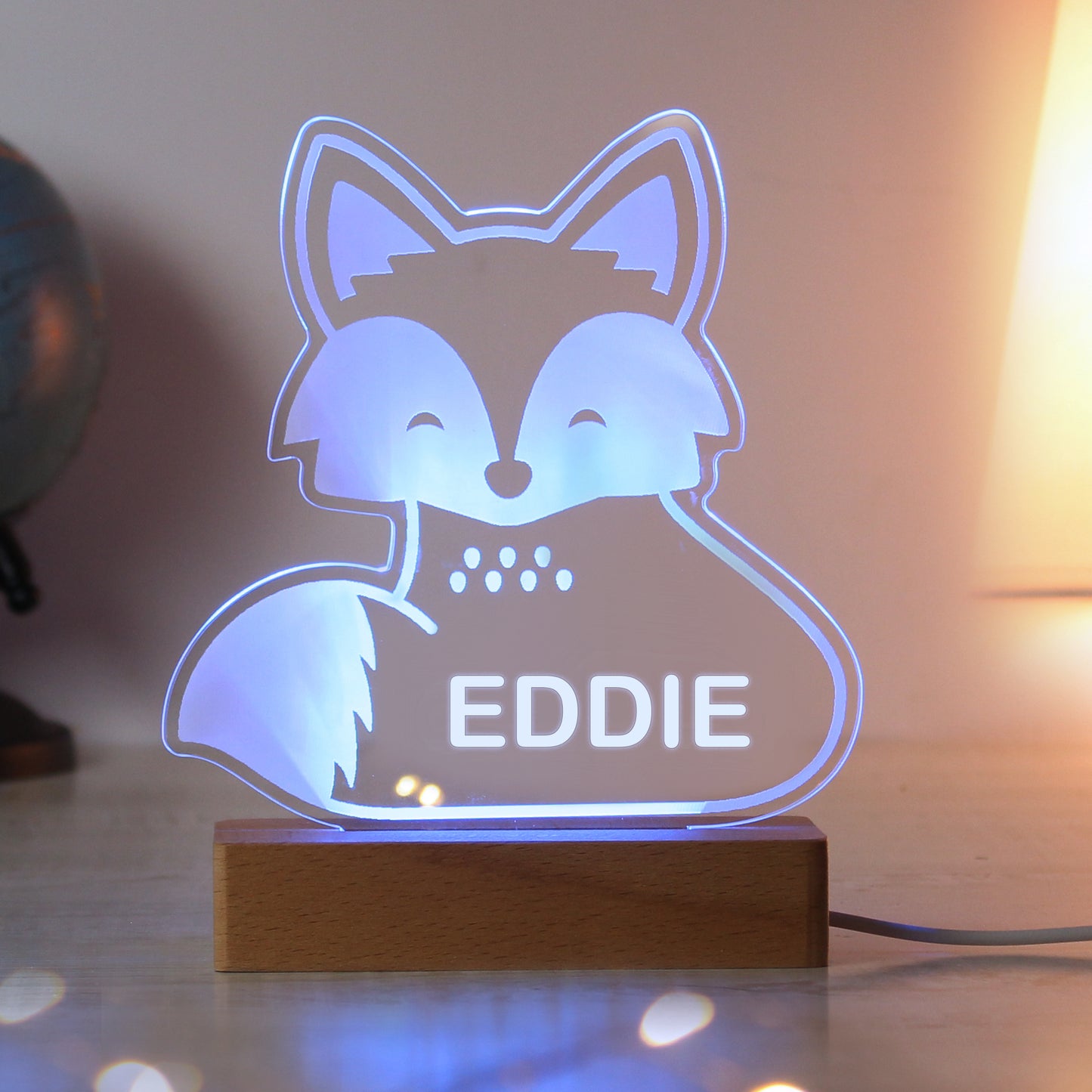 Childs LED light on wooden base. Fox personalised with your child's name. Changing or fixed colour and brightness settings. Shown in light blue