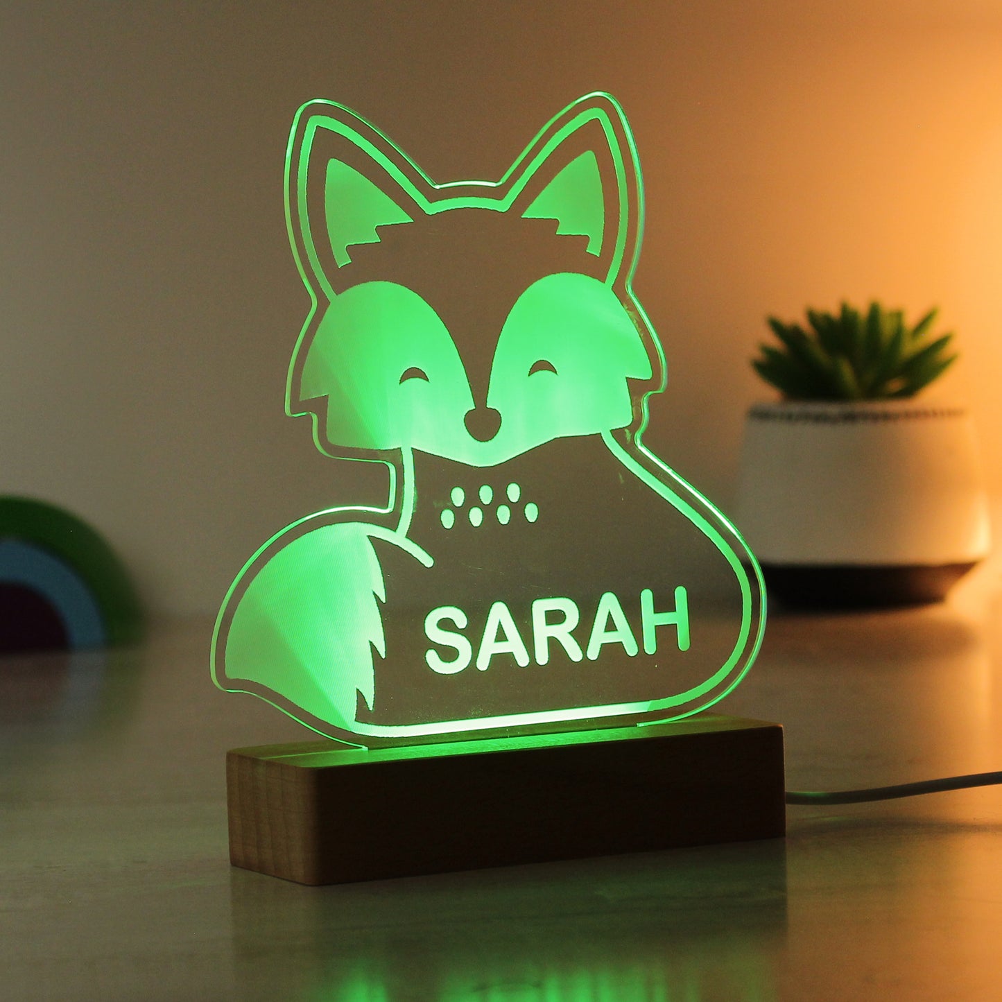 Childs LED light on wooden base. Fox personalised with your child's name. Changing or fixed colour and brightness settings. Shown in green