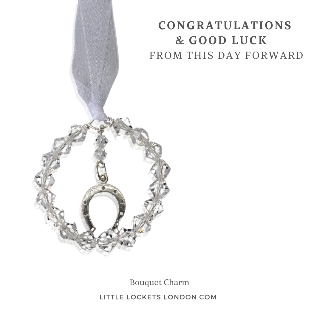 Sterling silver horseshoe charm surrounded by a circle fo high quality Austrian crystals. Mounted on card  with the word Congratualations and Good Luck, from this day forward. Or choose your own words.