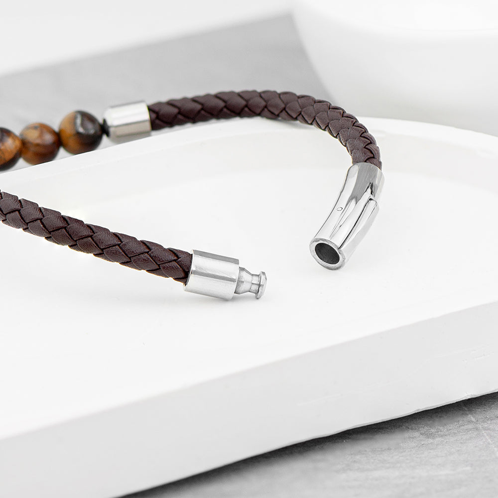 Barrel clasp which can be engraved with initials and message. Brown woven leather bracelet with five tiger's eye beads.