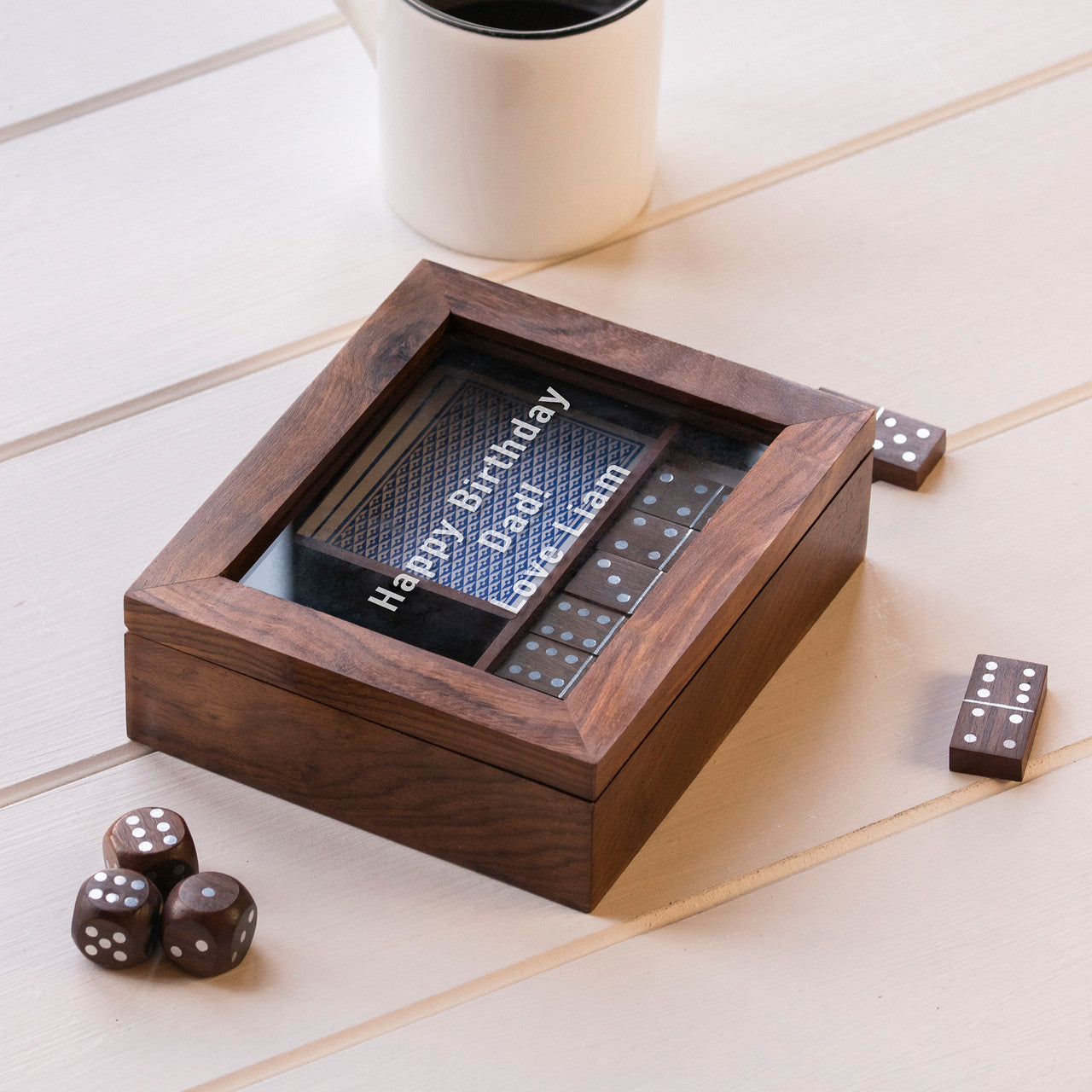 Handcrafted sheesham wood box holding dominos, playing cards and five dice. Glass lid is engraved witha message of your choice