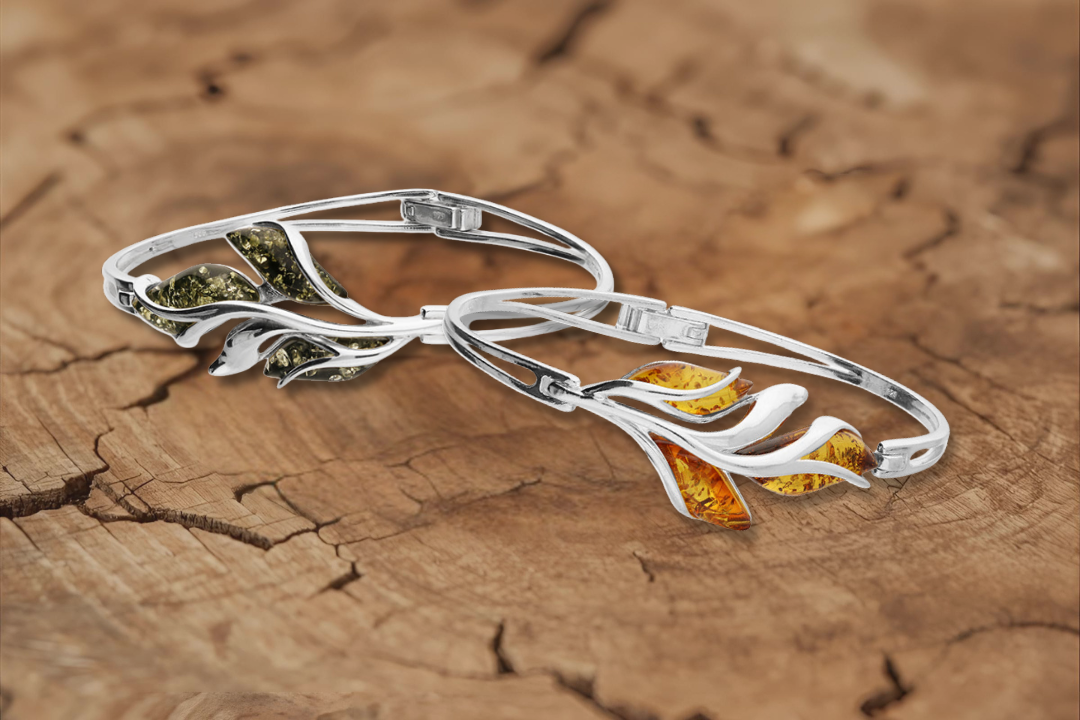 Sterling silver amber leaf bangle with cognac amber and green amber