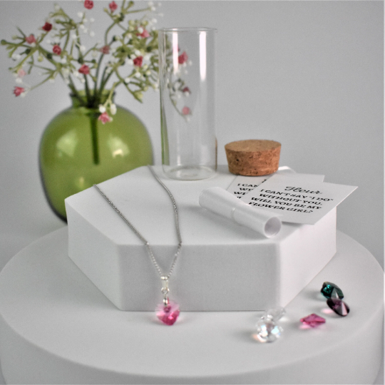 Crystal pendant shown with glass bottle, cork lid and scroll messages