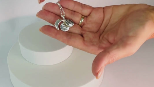 Pretty locket opens to reveal its own special message - love you to the moon and back