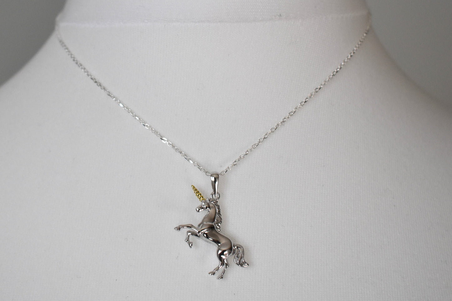Silver unicorn pendant necklace on a 14" sterling silver chain