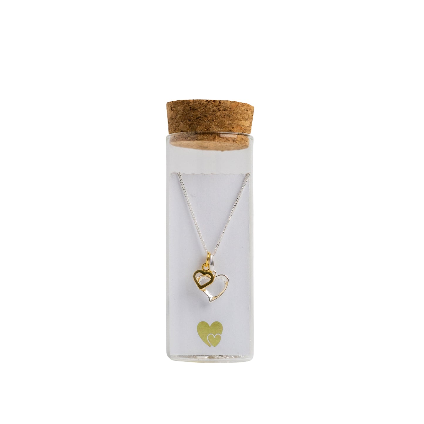 Message in a Bottle jewellery. A sterling silver heart is twinned with a smaller gold vermeil heart and suspended from a 16-18" sterling silver chain. The necklace is placed in a small glass bottle that includes a scroll for you to add your own message.