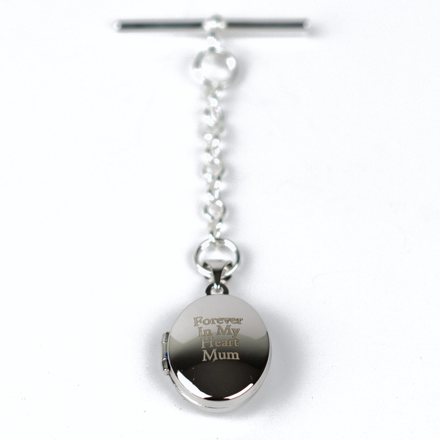 Sterling Silver Mens Engraved Photo Memorial Locket. Sterling silver elegant locket features a polished finish and offers the choice of a T-bar or spring clasp fastening. On gift card in gift box.