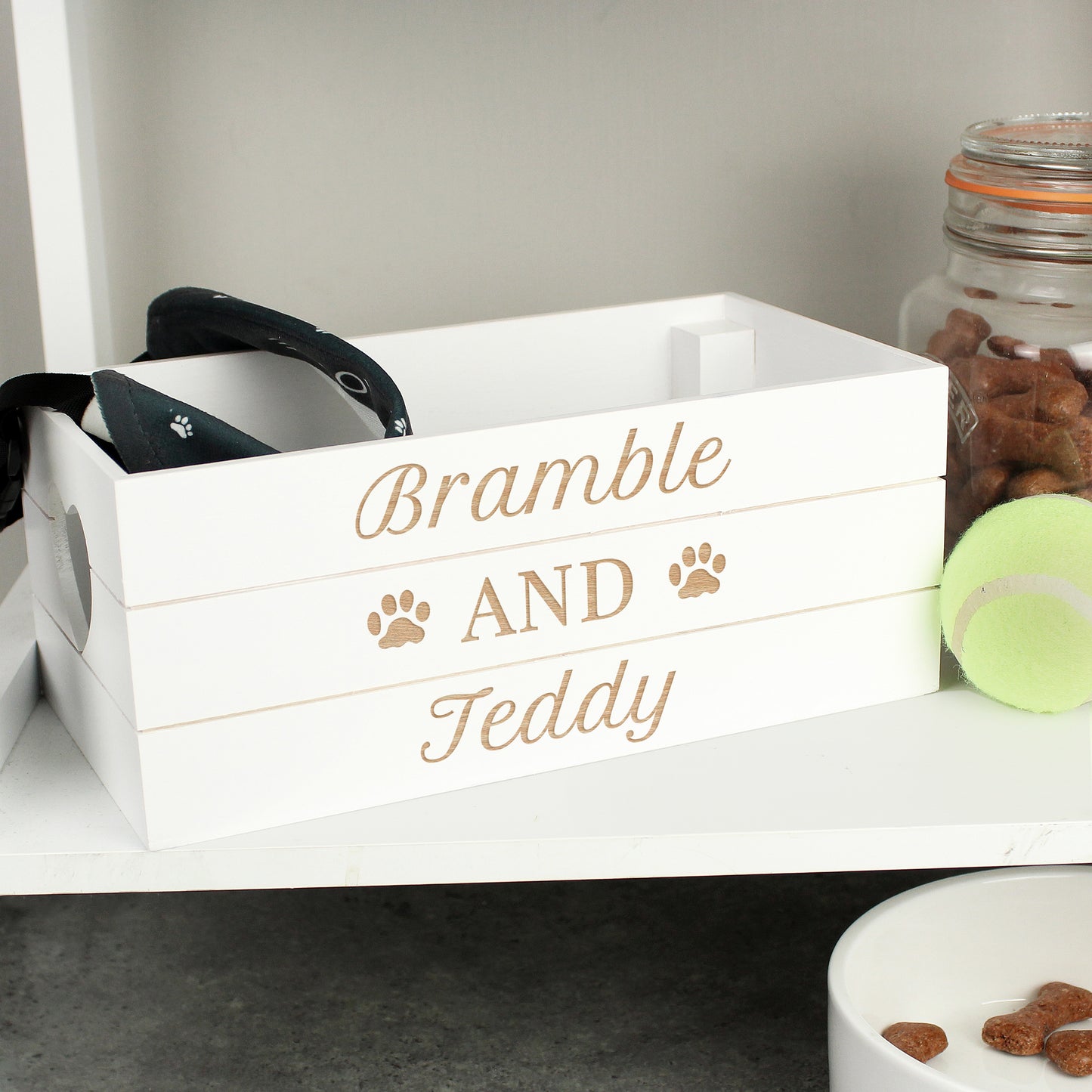 wooden crate personalised with paw prints and up to three lines of text to keep your pet things together. Heart shaped handles. Reclaimed wood.