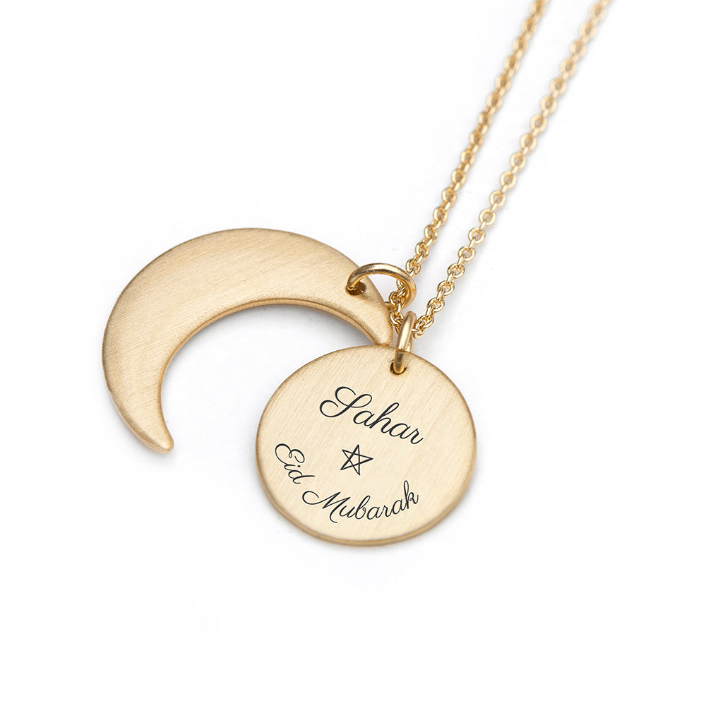 Gold plated Eid Mubarak Sun and Moon necklace. Engraved with Eid Mubarak . Personalise with engraved name.