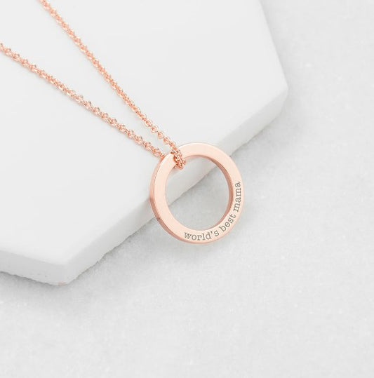 Rose gold plated ring charm necklace engraved with the message "World's best mama", complete with 18" rose gold plated chain