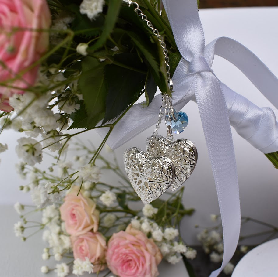 Double bouquet charm fastened to the bouquet with a lobster clasp