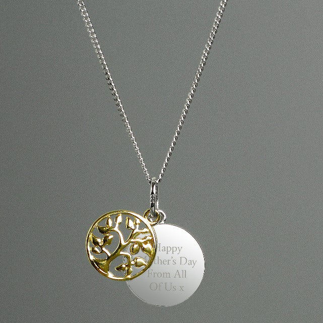Sterling silver disc engraved with your own message, alongside a gold plated tree of life charm, family tree pendant