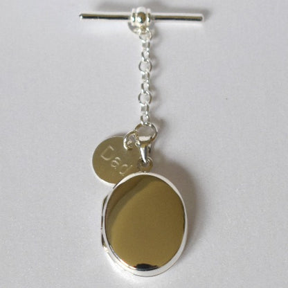 Sterling silver oval locket for jacket lapel