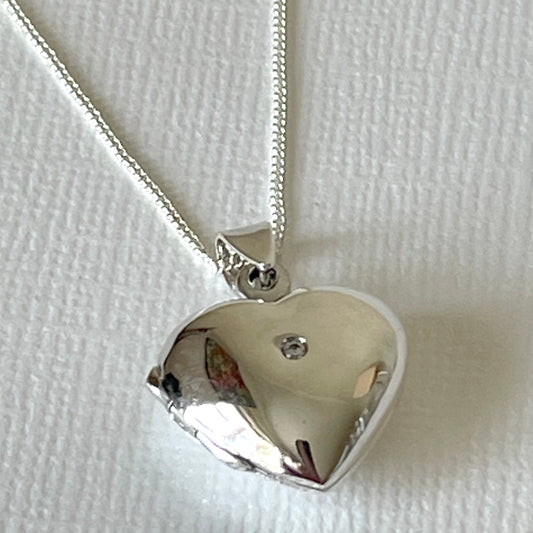 Sterling silver heart locket with cubic zircona stone