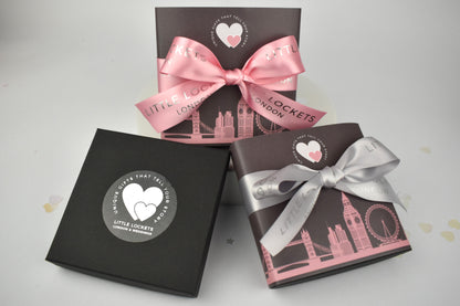 Choice of plain gift box or upgrade to a wrap and logo ribbon tie