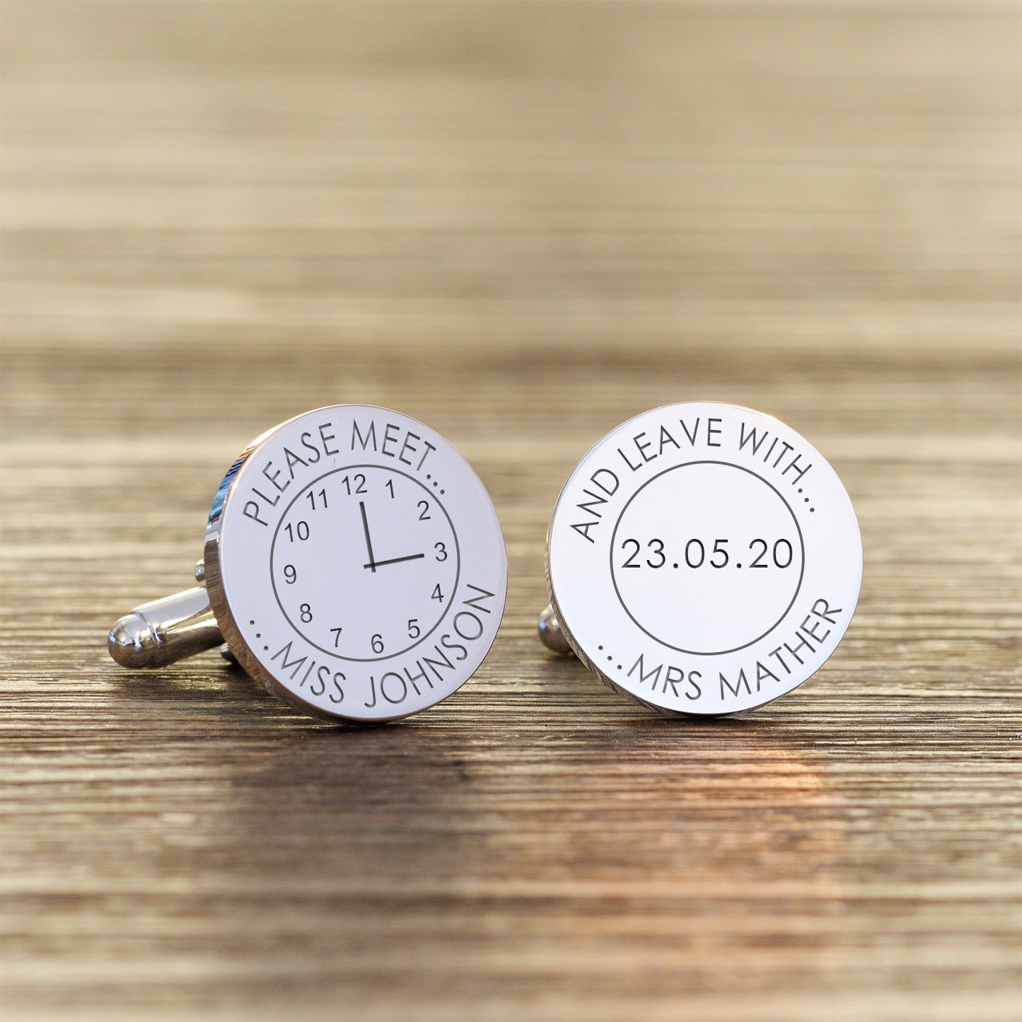Fun cufflinks for the groom. Circular silver finish cufflinks which carry the date of your wedding and the time on a clock face. The message on the first cufflink reads "please meet Ms ..." and the second cufflink reads "and leave with Mrs..."