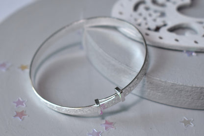 Sterling silver adjustable bangle with Celtic design