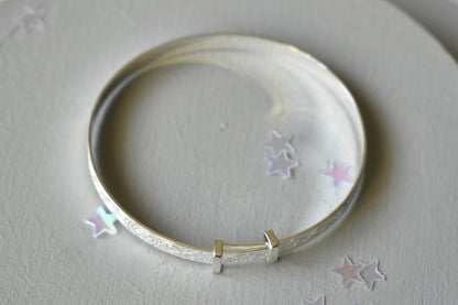 Sterling silver adjustable bangle with Celtic design