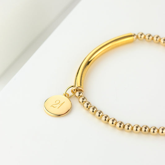 Gold filled bead and bar bracelet with engraved 21 disc