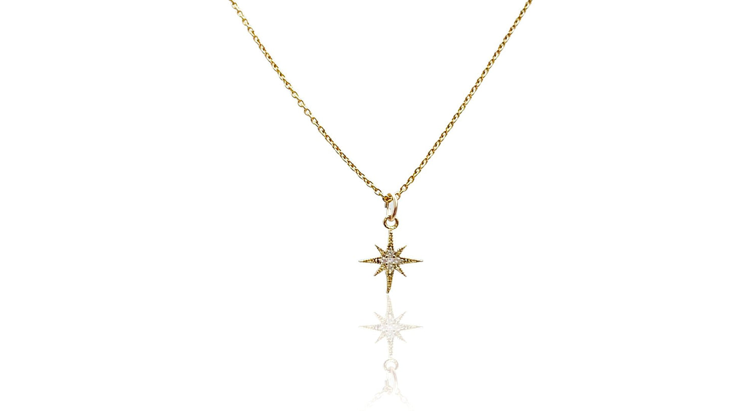 gold plated on sterling silver celestial star sparkling pendant. Your pendant arrives in a glass bottle. Includes a parchment scroll for you to add your own message in a bottle.