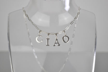 Ciao Sterling Silver Letter Necklace on a 16 inch drawn cable chain. On a bust.