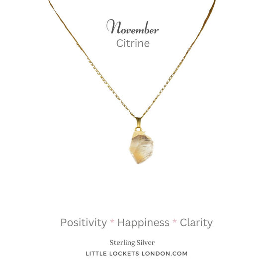 Citrine November birthstone shown with sterling silver gold plated tip. Mounted on sterling silver gold vermeil chain. The pendant is shown on a card as the November birthstone and with three of its qualities - positivity happinees and clarity