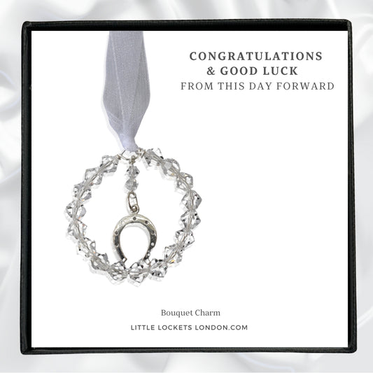 Sterling silver horseshoe charm surrounded by a circle fo high quality Austrian crystals. Gift boxed with the word Congratualations and Good Luck, from this day forward. Or choose your own words. 