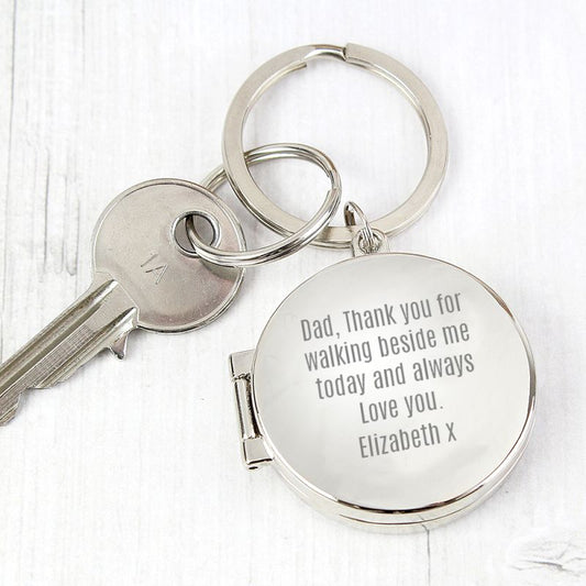 round chrome locket keyring with  personal emgraved message from the Bride to her Dad - Thank you for walking beside me today and always, love you. Elizabeth. Takes two photographs