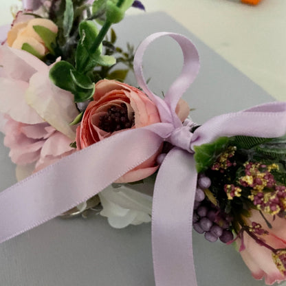 close up of satin ribbons on Dog flower garland on leather collar lilac tones